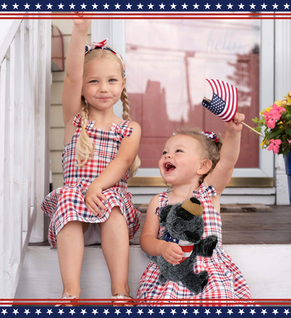 SUPER-SOFT PLUSH - LYING BLACK BEAR WITH USA FLAG BANDANA