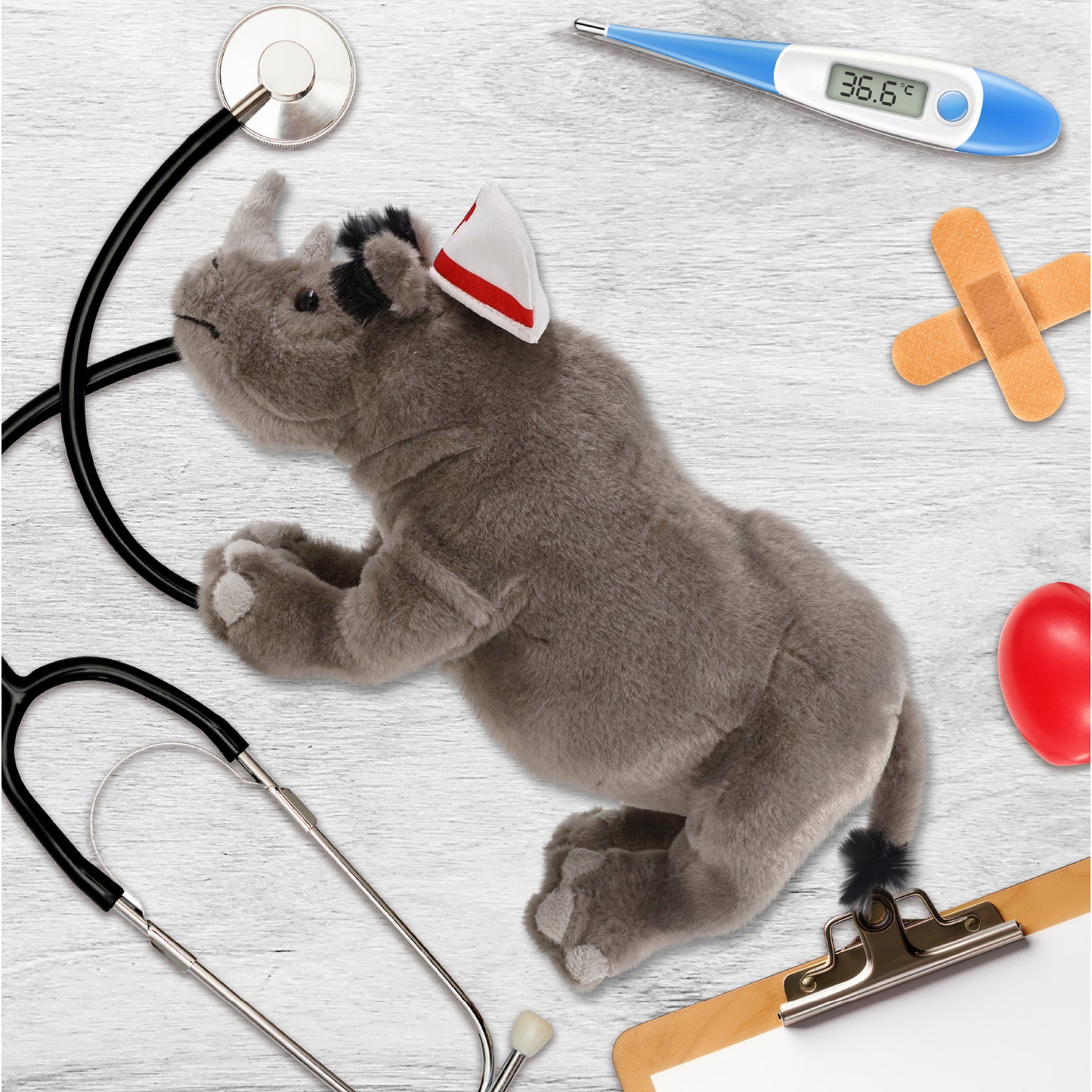 WILD COLLECTION PLUSH - 13" RHINO NURSE