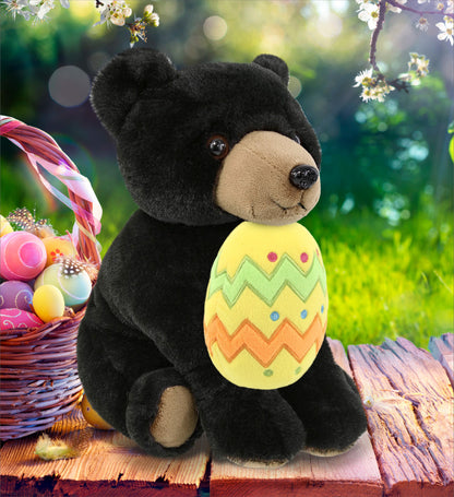 DolliBu Super Soft Floppy Black Bear with Yellow Easter Egg Plush - 9 Inches
