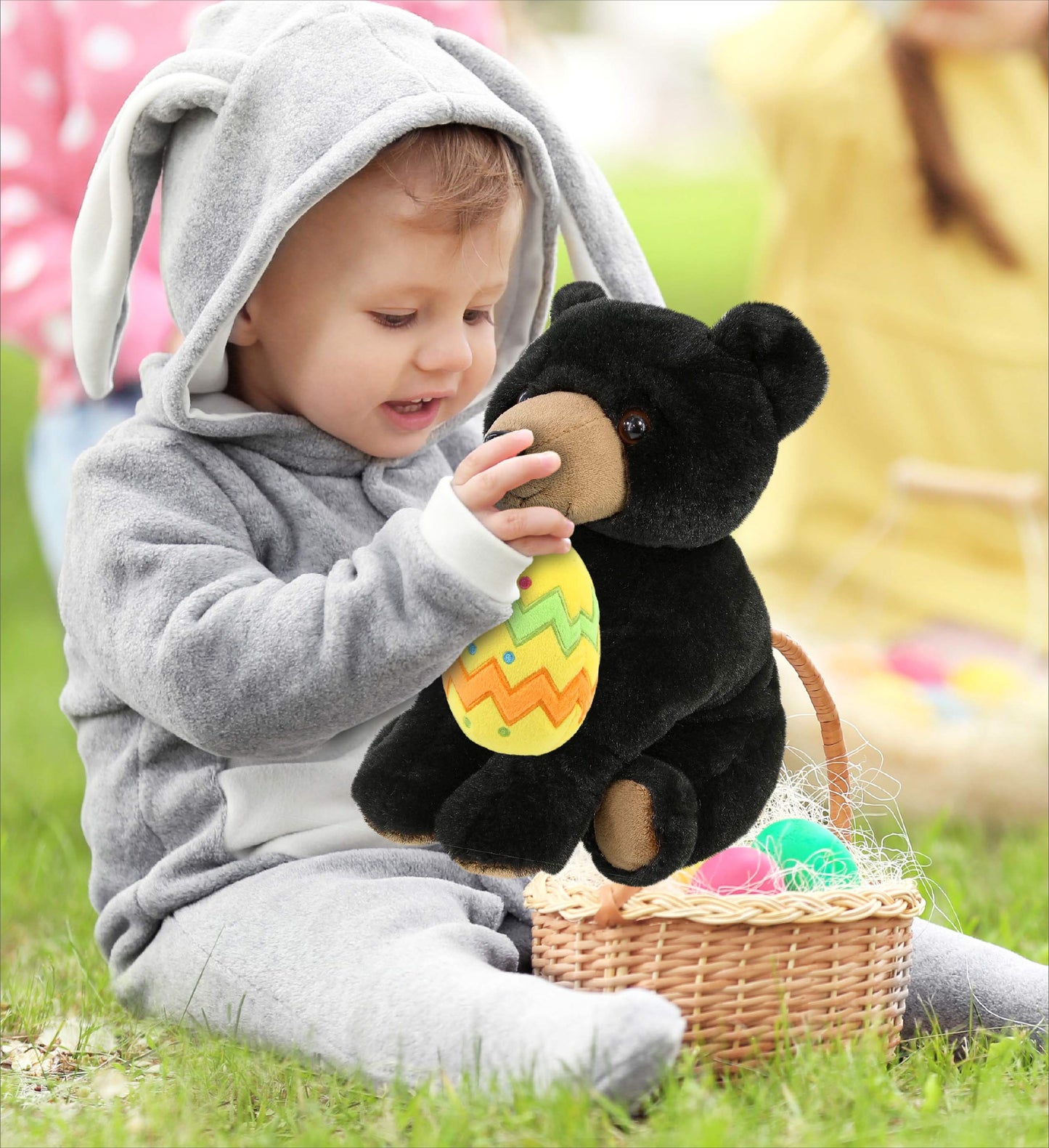 DolliBu Super Soft Floppy Black Bear with Yellow Easter Egg Plush - 9 Inches