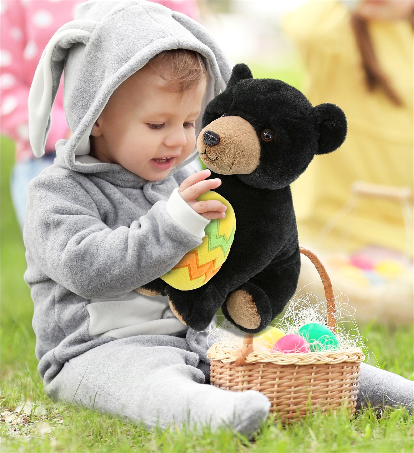DolliBu Soft Large Floppy Black Bear with Yellow Easter Egg Plush - 12 Inches