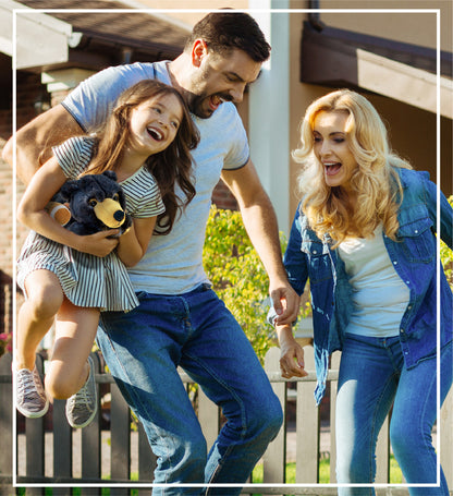 SUPER SOFT PLUSH - LYING WILD BLACK BEAR WITH FOOTBALL PLUSH