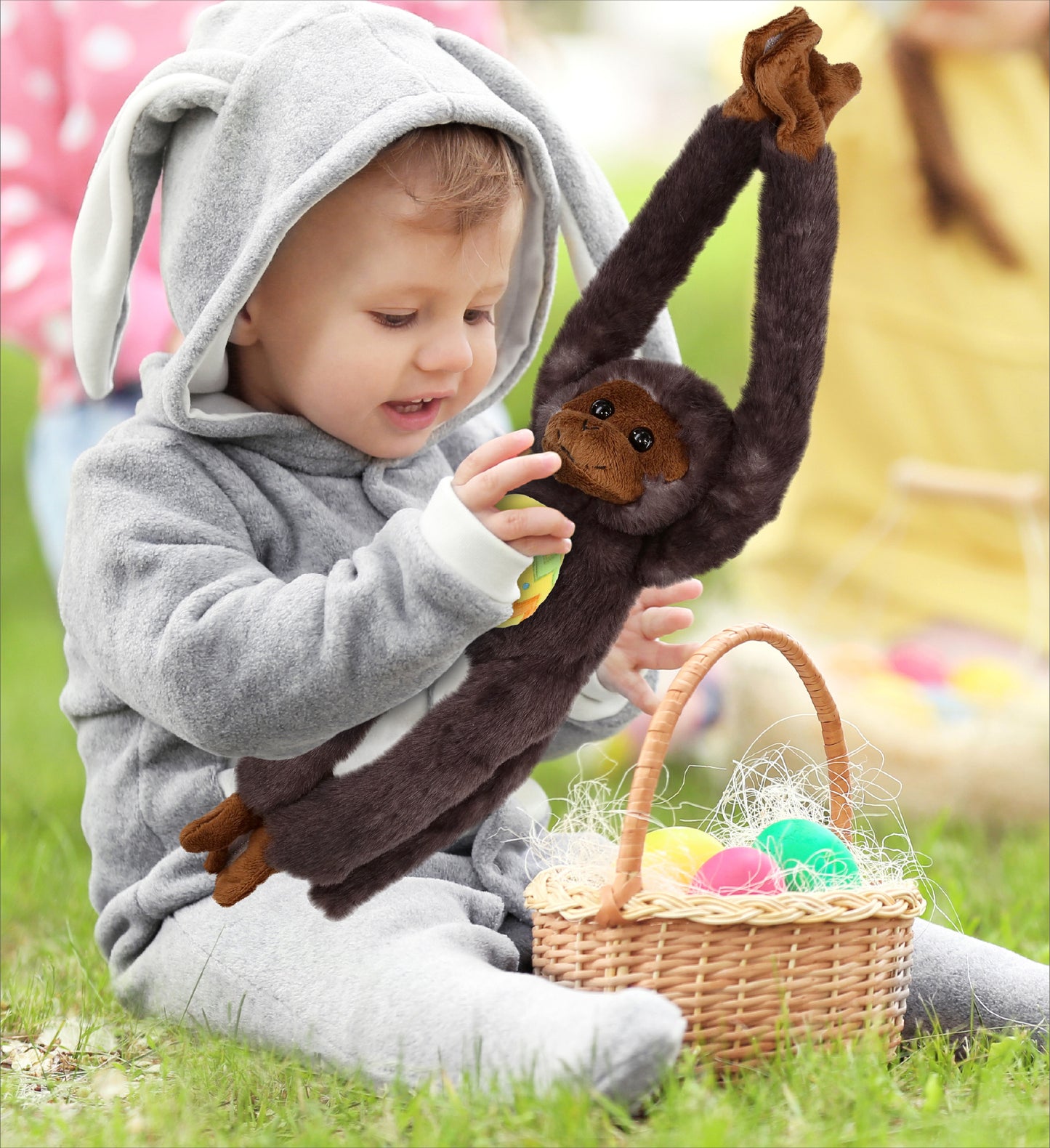DolliBu Long Arm Black Capuchin Monkey with Yellow Easter Egg Plush - 21 Inches